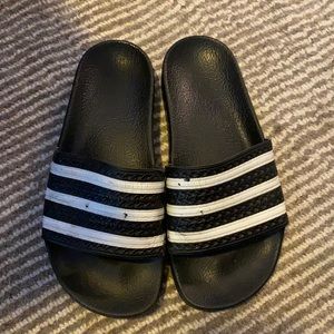 Black adidas slides